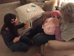 Rachel reading to sweet Baby Annalise. The doctors said Annalise would only live hours. She is eight months old. He makes beautiful things. 