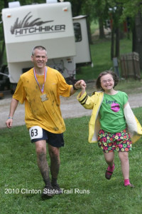 Ultra man's routine - crossing the finish line with his girl. 