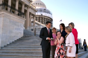 Excited to present her Congressman with his NDSS Champion of Change Award on the Capitol steps. State Rep. Erin Davis, NDSS President Sara Weir, KS Advocate Rebecca McCaulley and mom look on. 